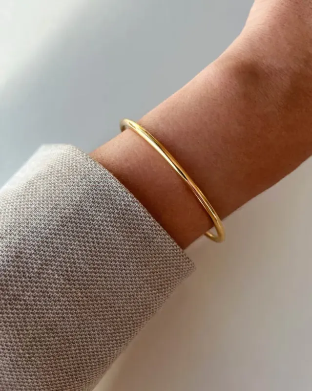 Minimalist Bangle Bracelet sold by Regina jewelry