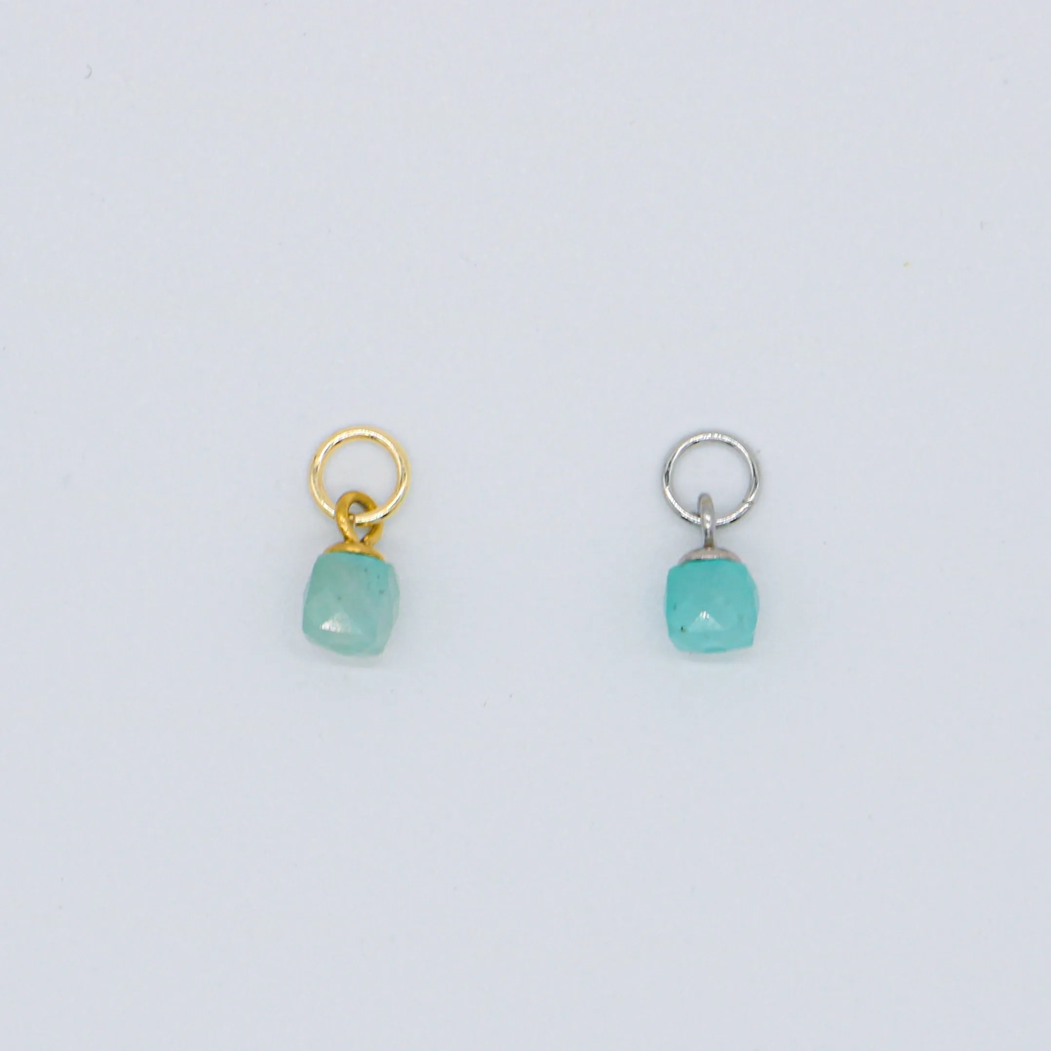 Mini Aquamarine Charm sold by Regina jewelry