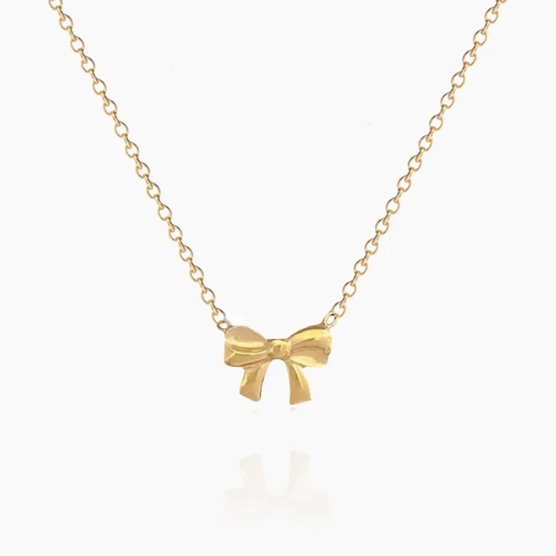 Delicate Bow Tie Necklace sold by Regina jewelry