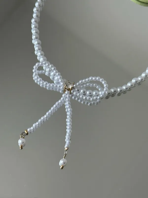 Bow Pearl Necklace sold by Regina jewelry
