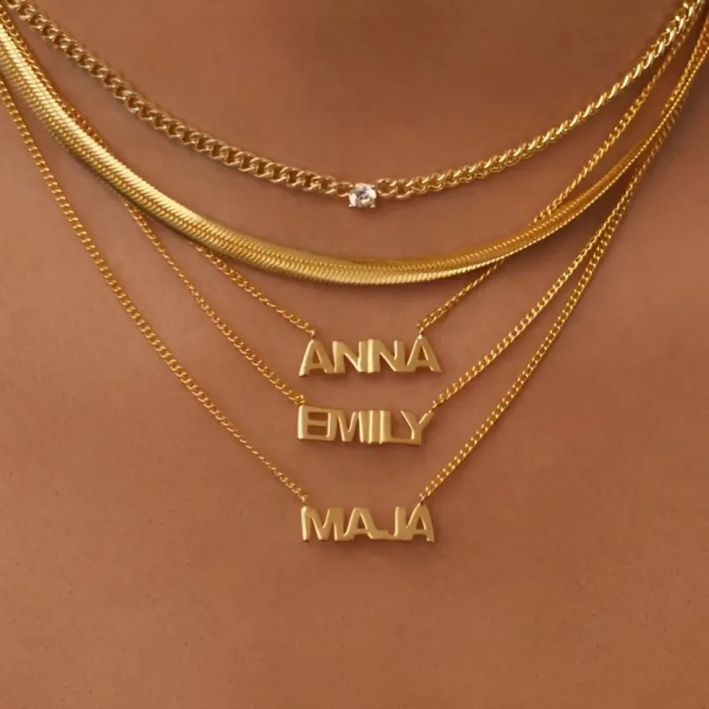 Custom Nameplate Necklace sold by Regina jewelry