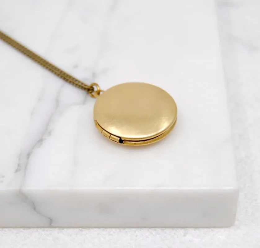 Round Locket Necklace sold by Regina jewelry