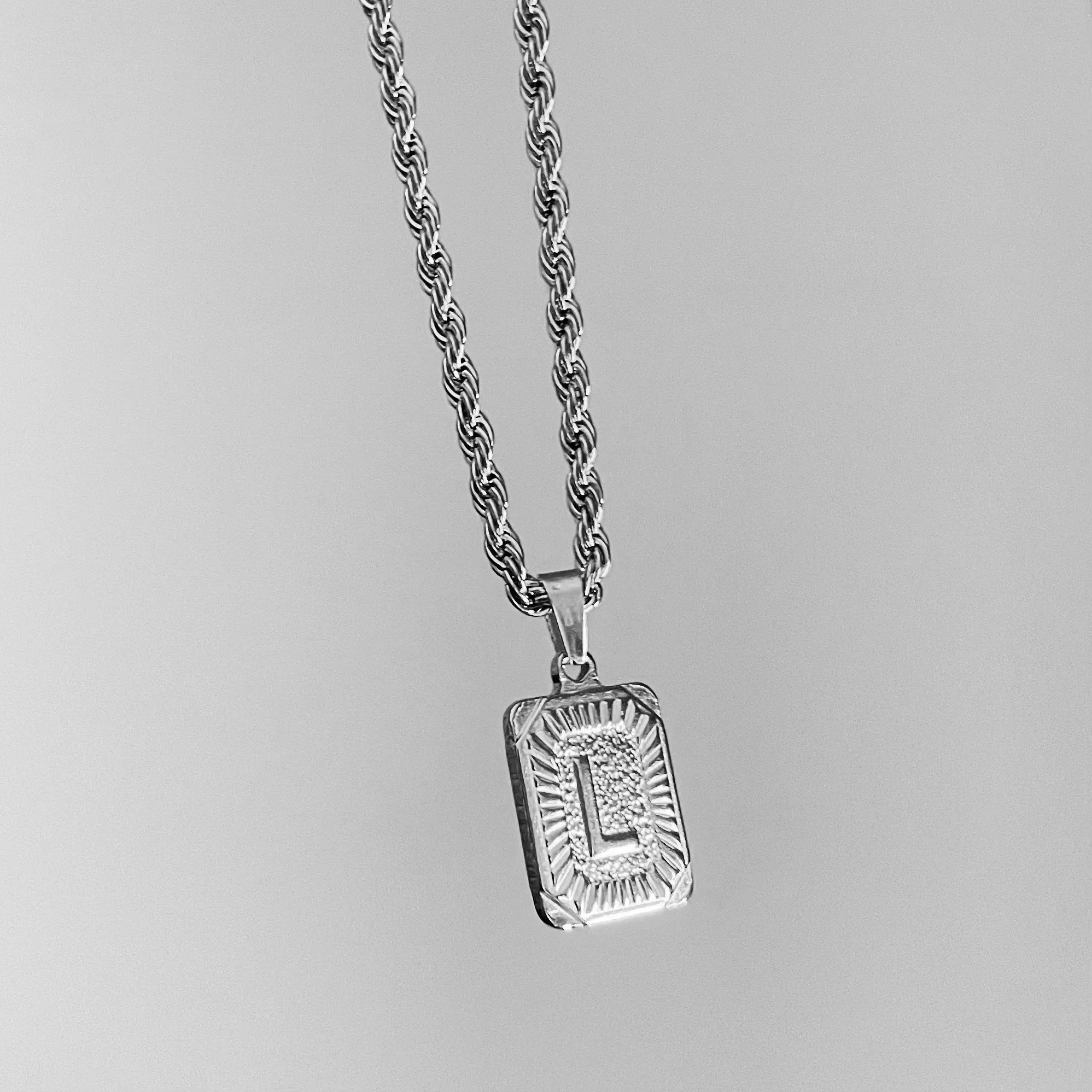 Stella Initial sold by Regina jewelry product image thumbnail 4