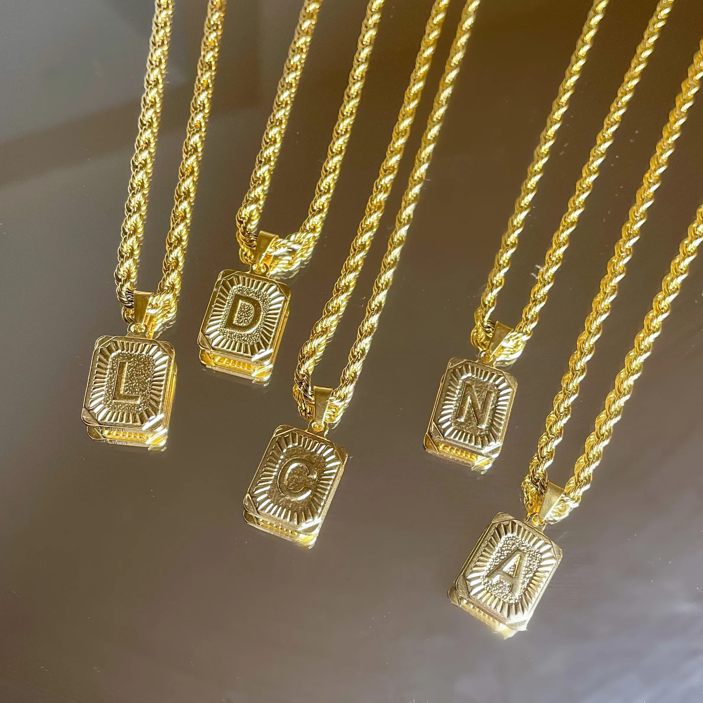 Stella Initial sold by Regina jewelry product image thumbnail 5