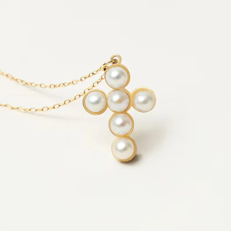 Dainty Pearl Cross sold by Regina jewelry