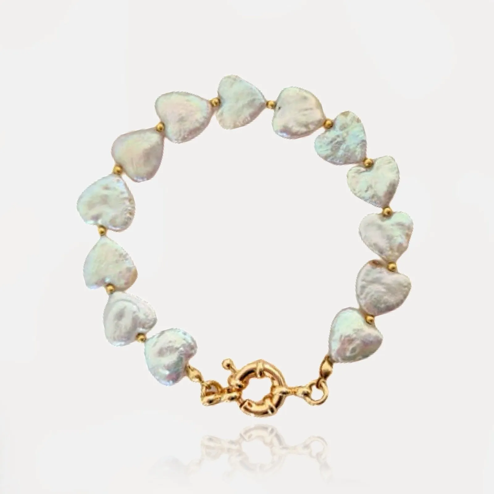 Natural Pearl Hearts Bracelet sold by Regina jewelry