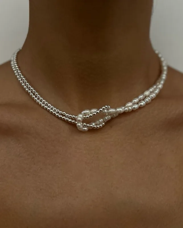 Natural Pearl Knot Necklace sold by Regina jewelry