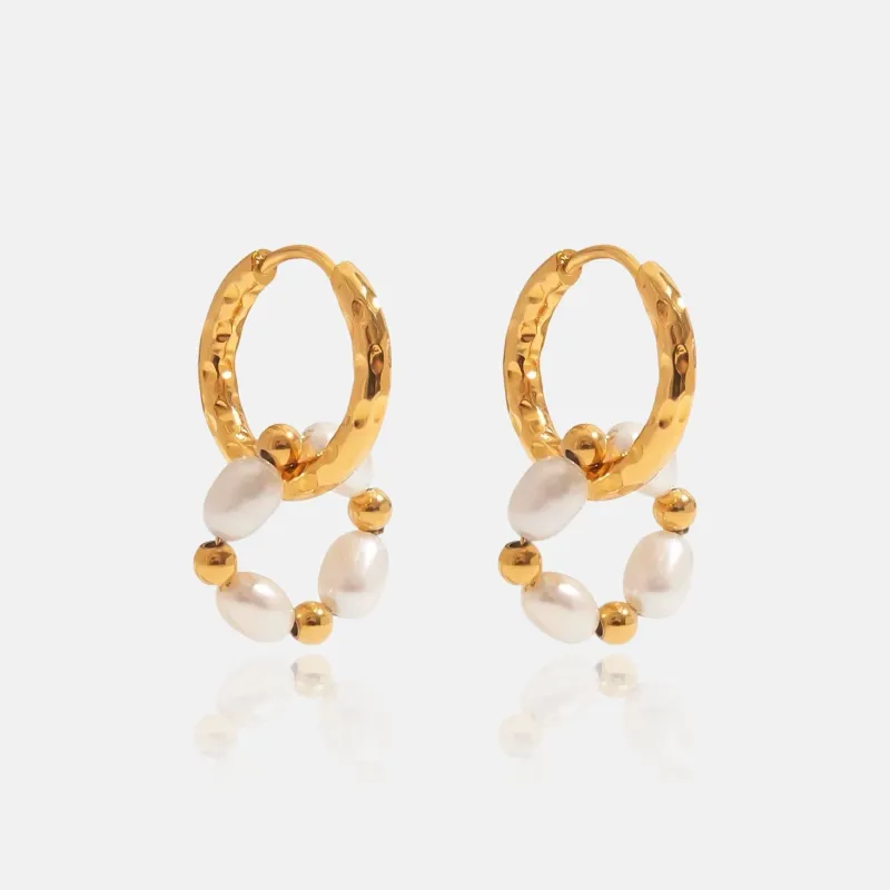 Molten Pearl Hoop Earrings sold by Regina jewelry