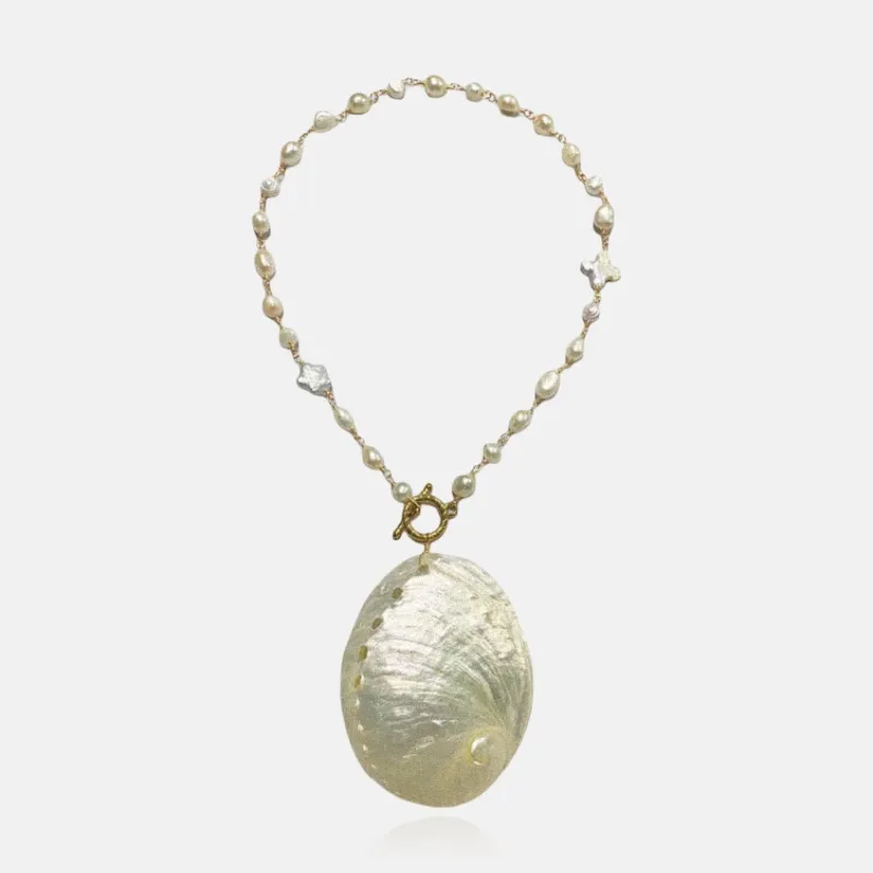 Ocean’s Secret Natural Shell Necklace sold by Regina jewelry