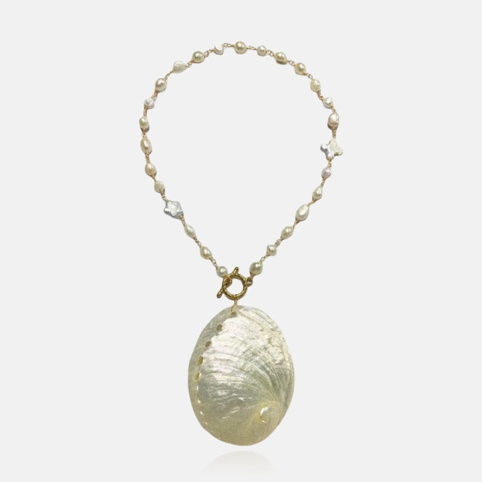Ocean’s Secret Natural Shell Necklace sold by Regina jewelry