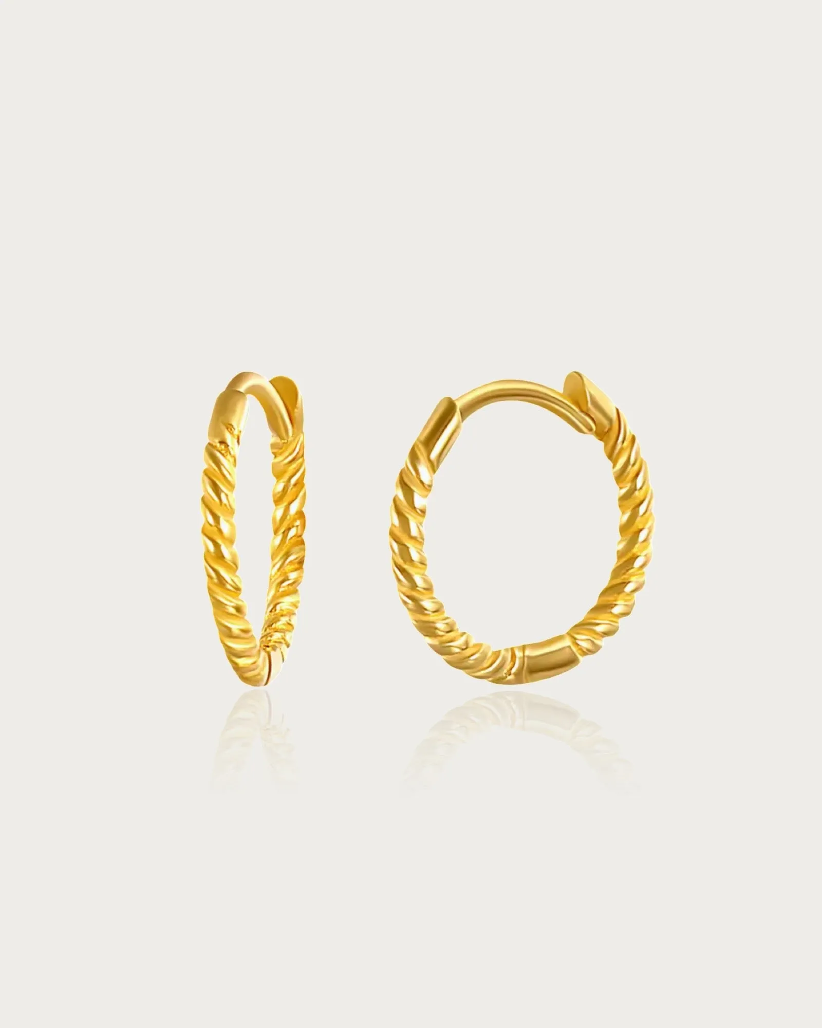 Mini Twisted Hoop Earrings sold by Regina jewelry
