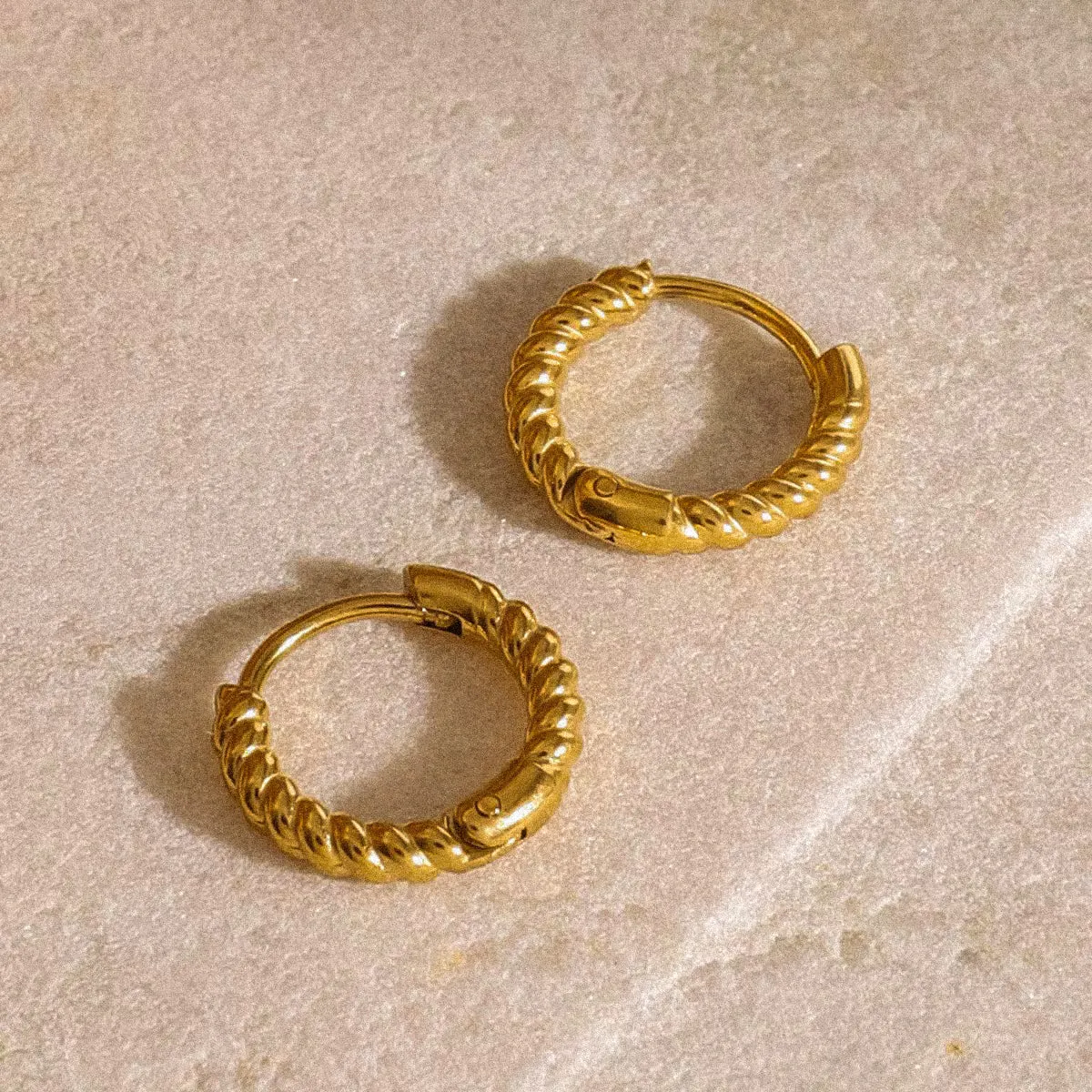 Mini Twisted Hoop Earrings sold by Regina jewelry product image thumbnail 3