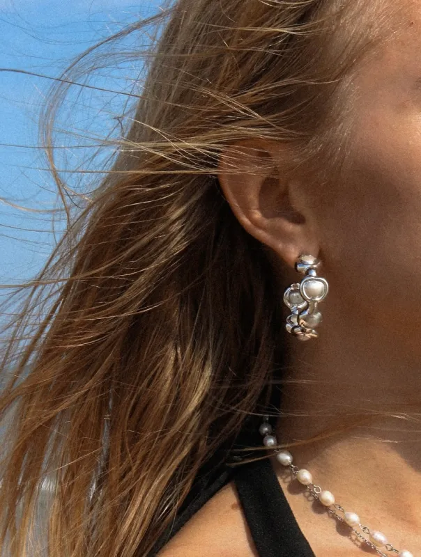 Molten Pearl Hoops sold by Regina jewelry