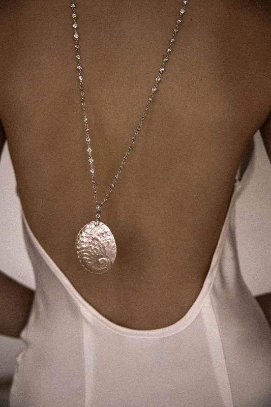 Ocean’s Secret Сrystals Shell Necklace sold by Regina jewelry