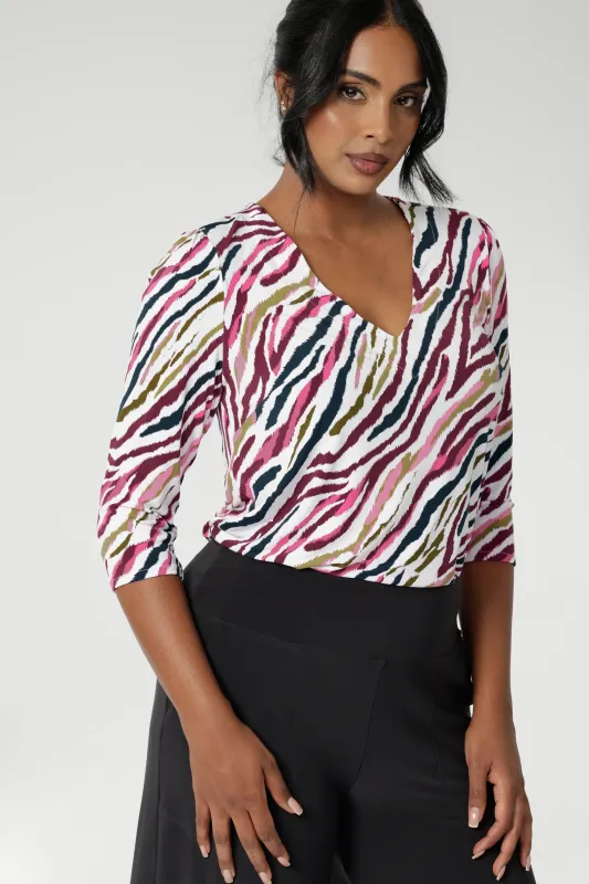 Vida Top in Rainbow Zebra sold by Leina & Fleur