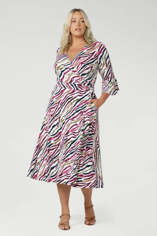 Portia Wrap Dress in Rainbow Zebra sold by Leina & Fleur