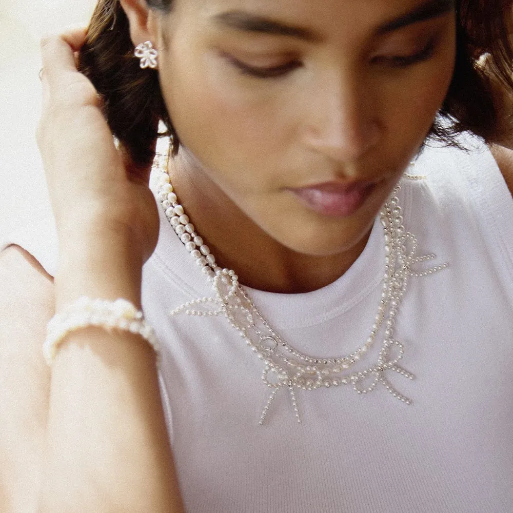 Pearl Bow Station Necklace Sterling Silver sold by Daisy Jewellery product image thumbnail 4