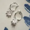 Spiral Sun Charm Earrings Sterling Silver sold by Daisy Jewellery