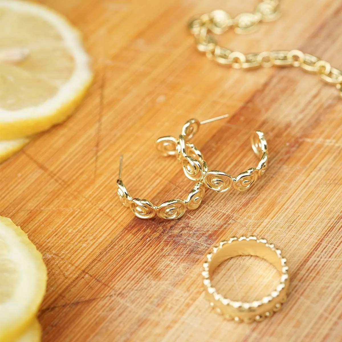 Spiral Hoop Earrings 18ct Gold Plate sold by Daisy Jewellery product image thumbnail 3