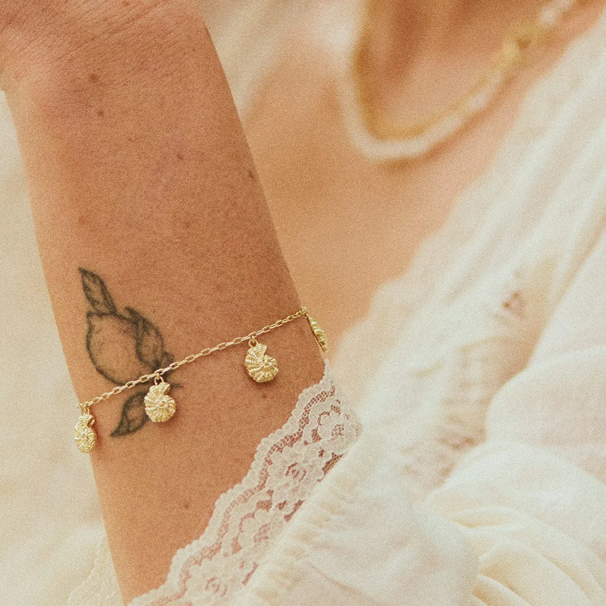 Polly Shell Charm Bracelet 18ct Gold Plate sold by Daisy Jewellery product image thumbnail 2