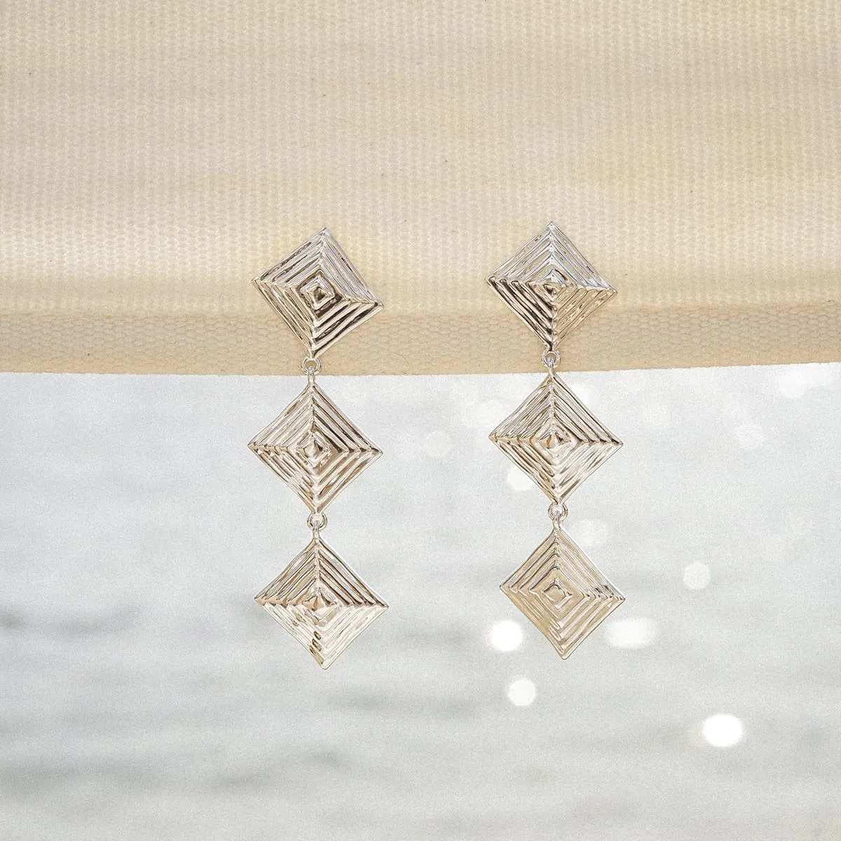 Strata Triple Drop Earrings Silver Plate sold by Daisy Jewellery product image thumbnail 3