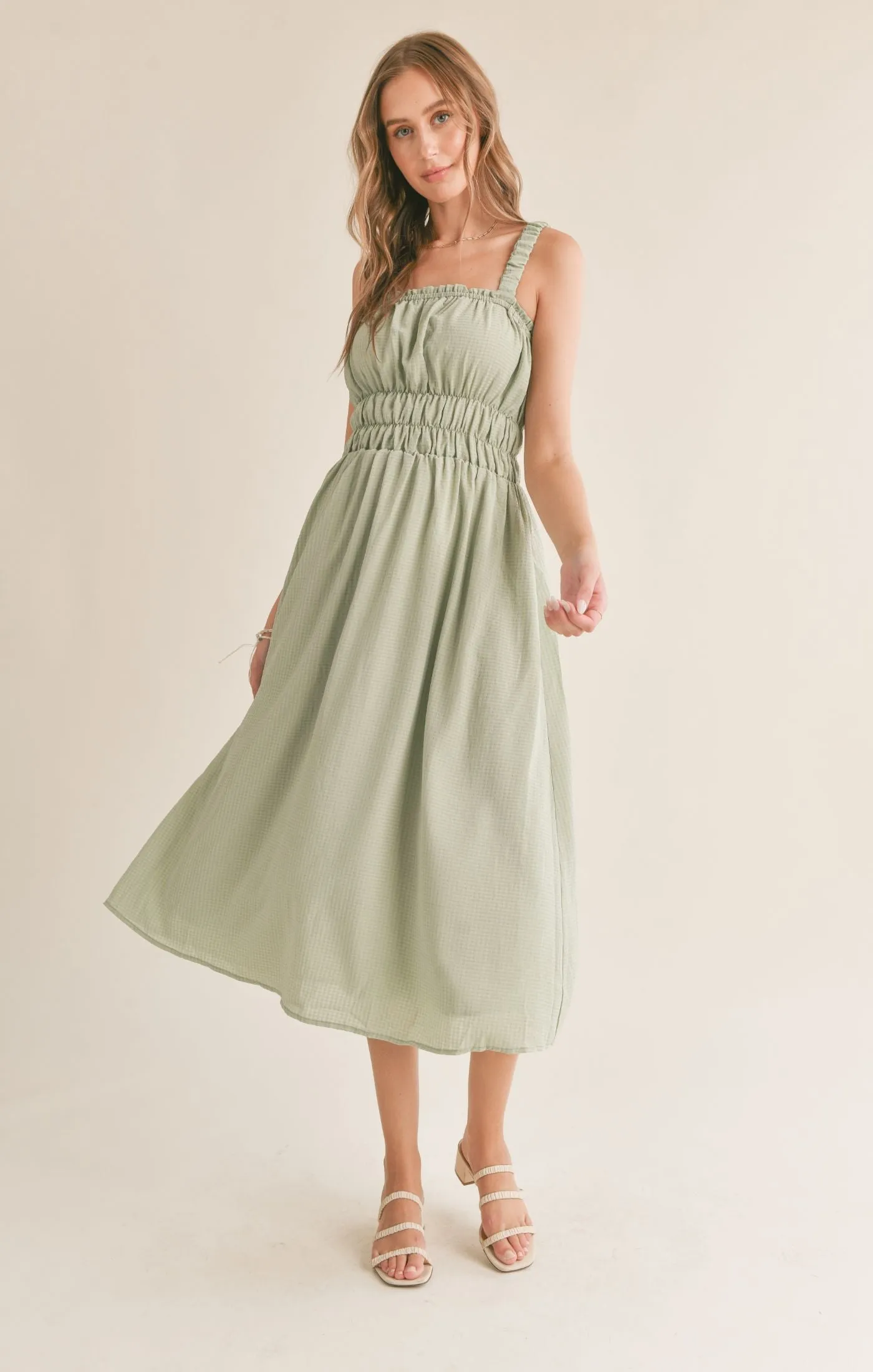The Heat Gathered Midi Dress sold by Plenty