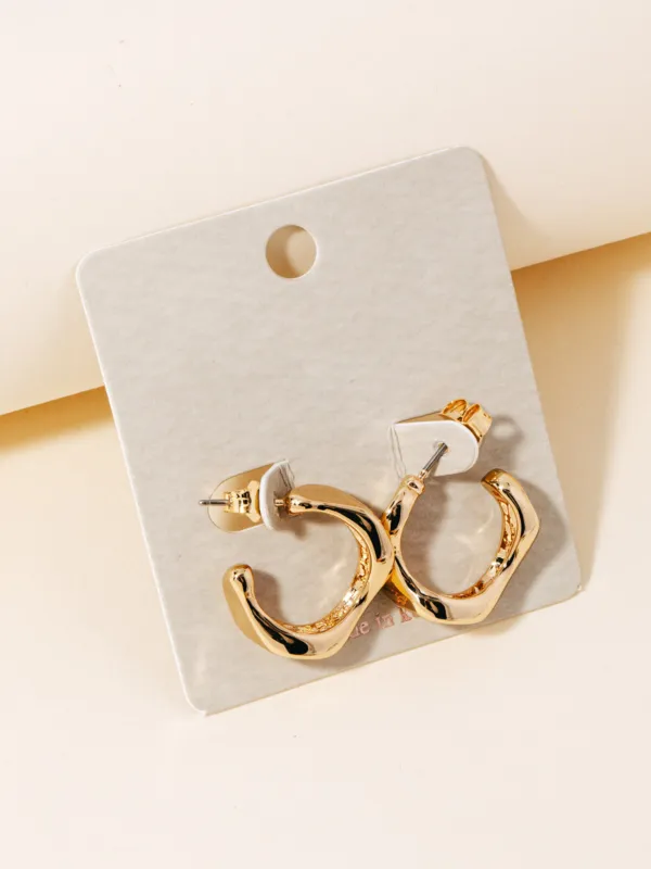Cut Out Hoop Earrings sold by Plenty