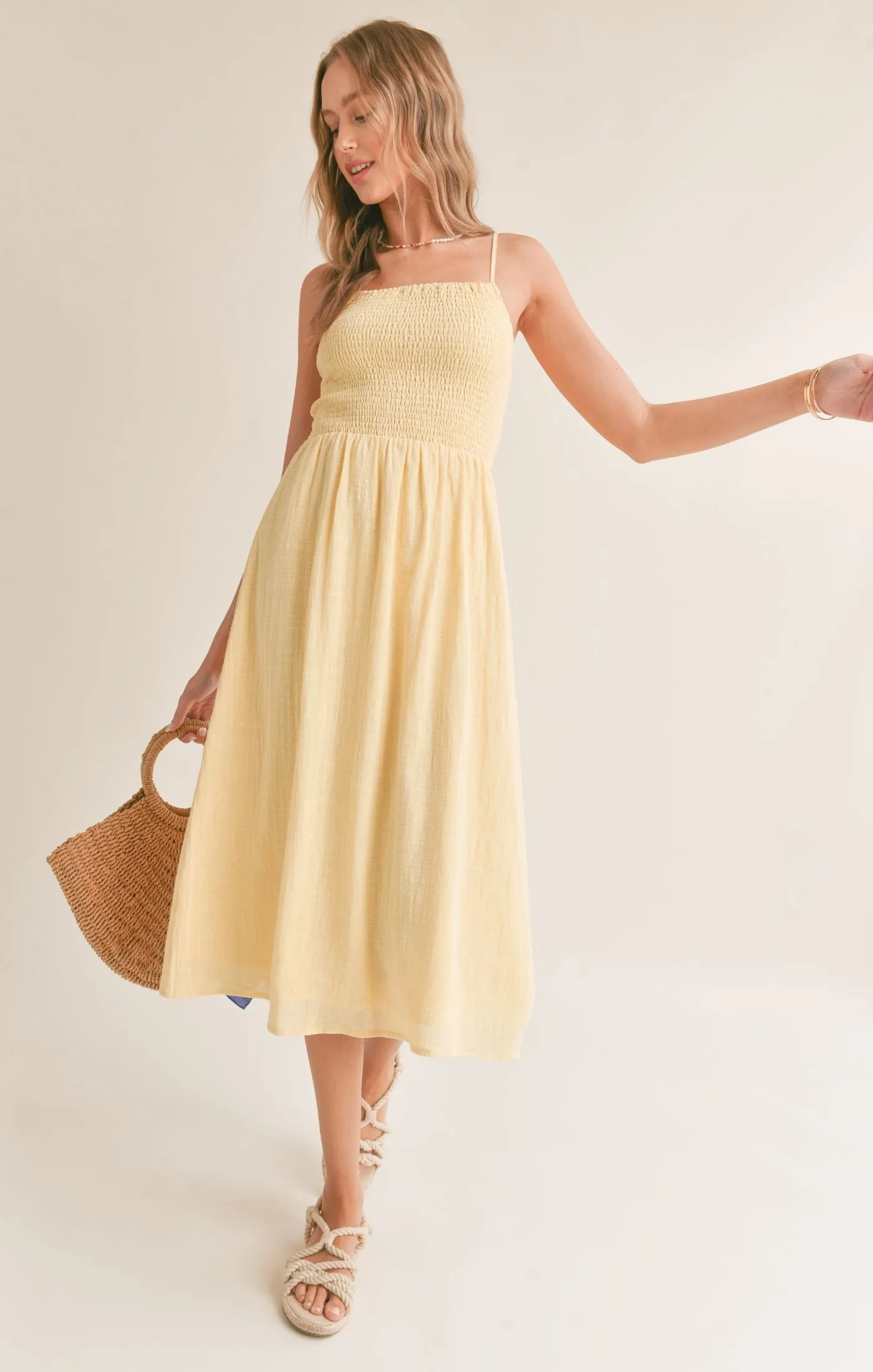 Bird Song Smocked Midi Dress sold by Plenty