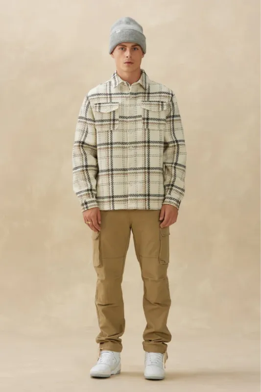 Heavyweight Plaid Shacket sold by Below the Belt