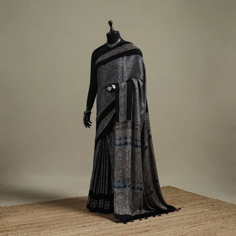 Black - Natural Dyed Hand Block Print Modal Silk Ajrakh Saree with Tassels 08 sold by Itokri