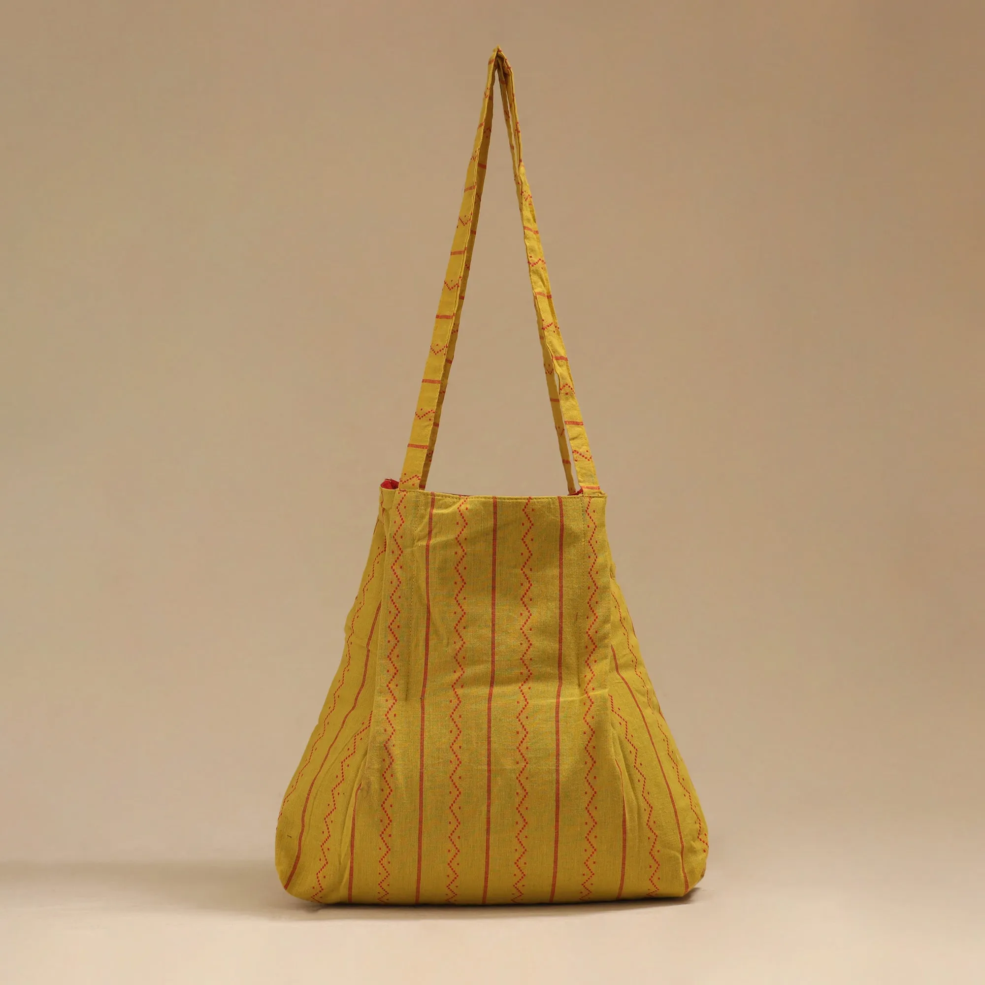 Yellow - Handcrafted Fabric Jhola Bag 01 sold by Itokri