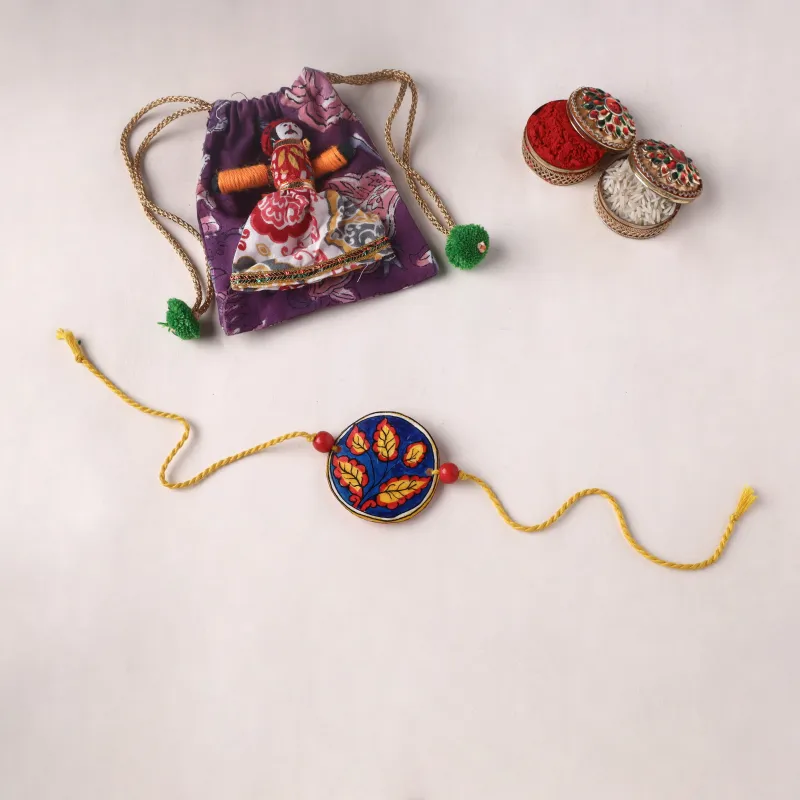 Handpainted Tholu Bommalata Leather Rakhi (Assorted) 12 made by Itokri