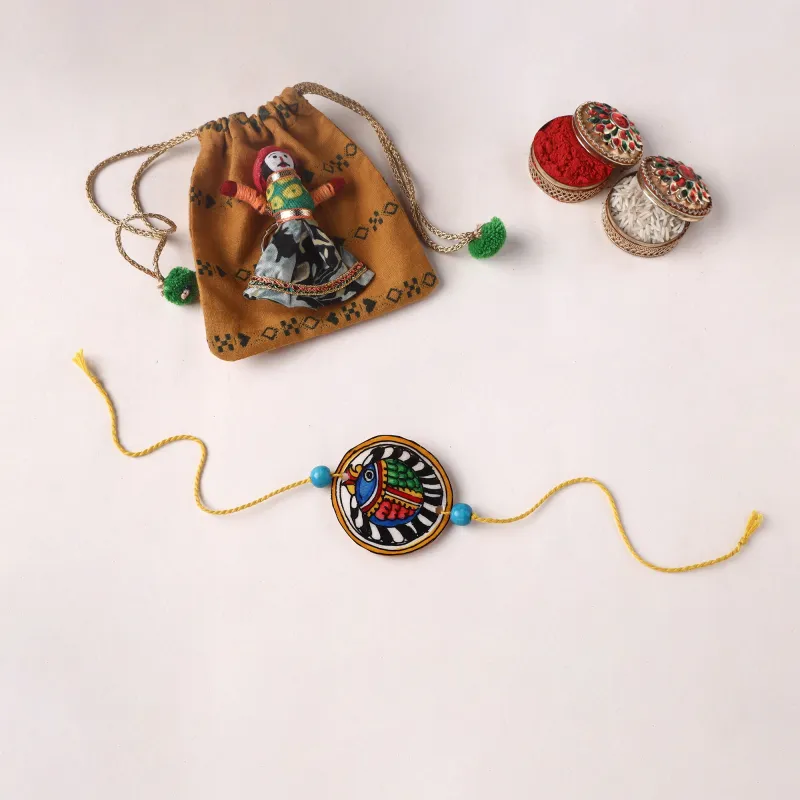 Handpainted Tholu Bommalata Leather Rakhi (Assorted) 07 made by Itokri