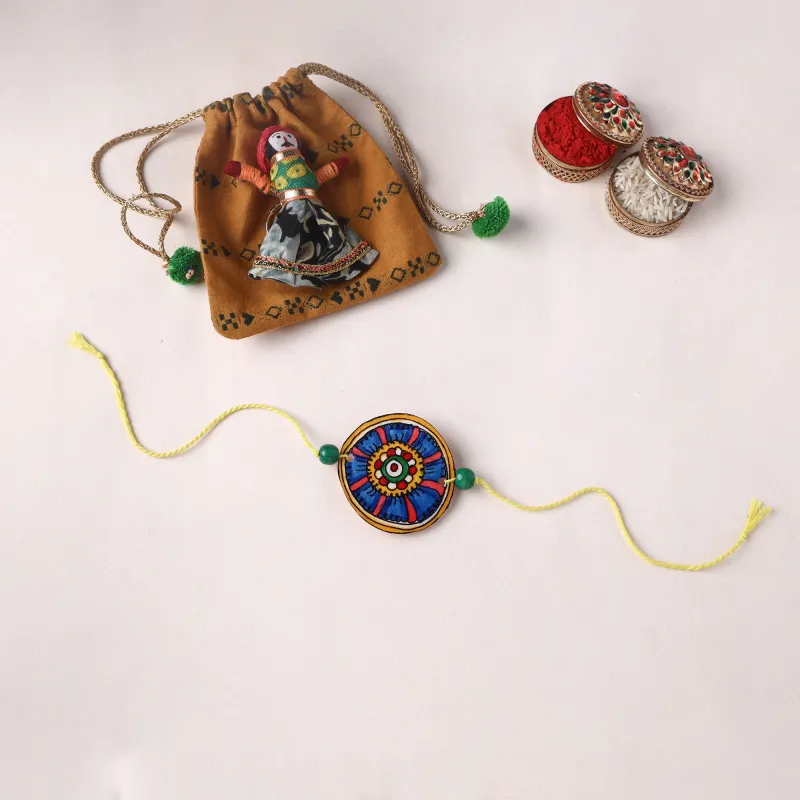 Handpainted Tholu Bommalata Leather Rakhi (Assorted) 03 made by Itokri