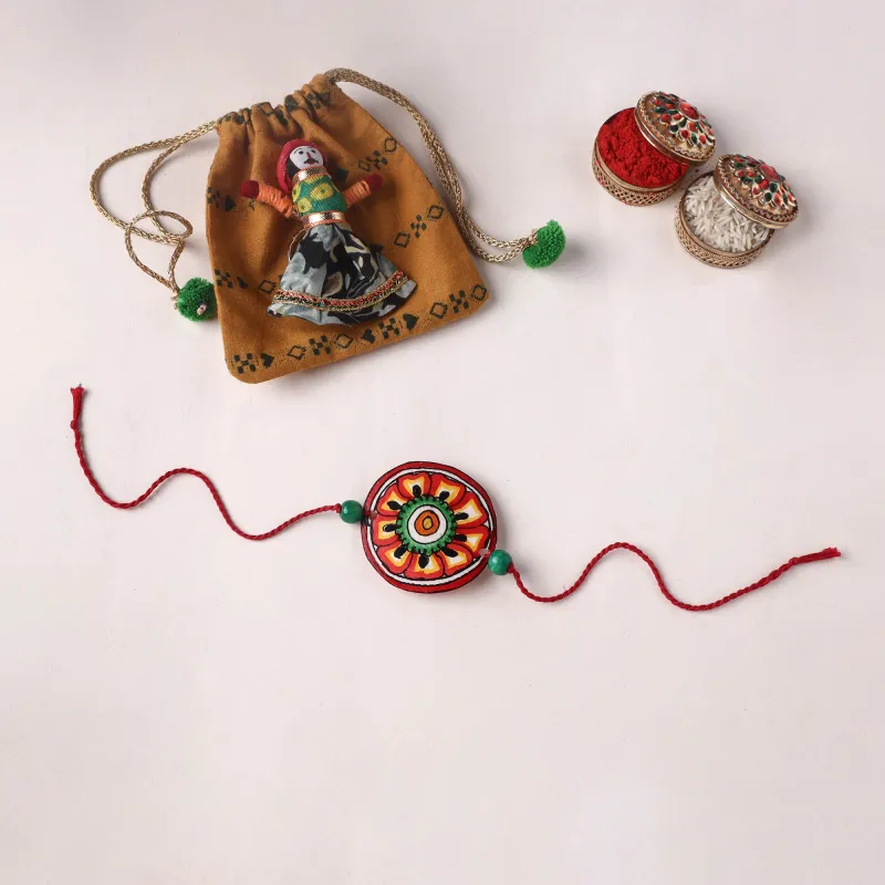 Handpainted Tholu Bommalata Leather Rakhi (Assorted) 01 made by Itokri