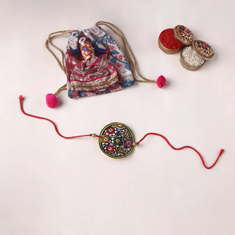 Flower - Handpainted Tholu Bommalata Leather Rakhi (Assorted) 39 made by Itokri