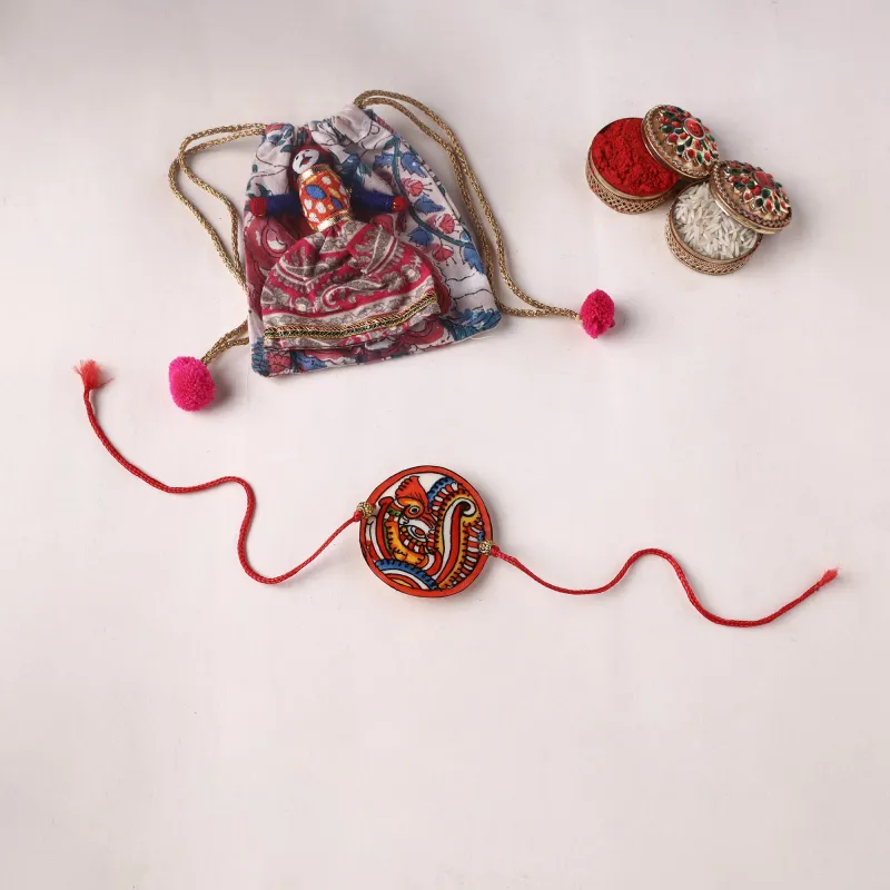 Peacock - Handpainted Tholu Bommalata Leather Rakhi (Assorted) 37 made by Itokri