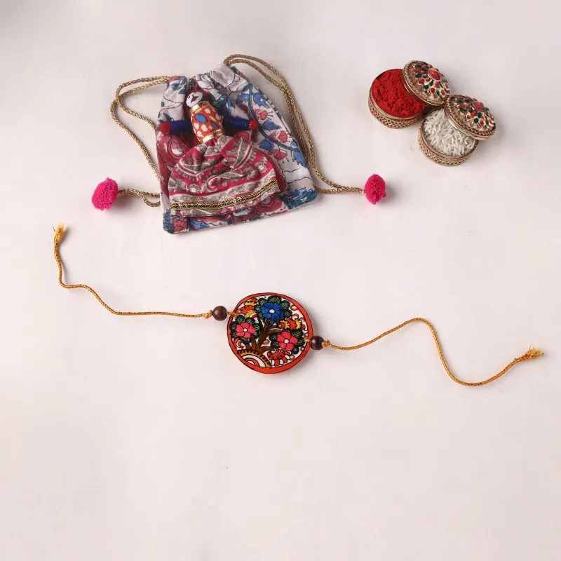 Flower - Handpainted Tholu Bommalata Leather Rakhi (Assorted) 31 made by Itokri