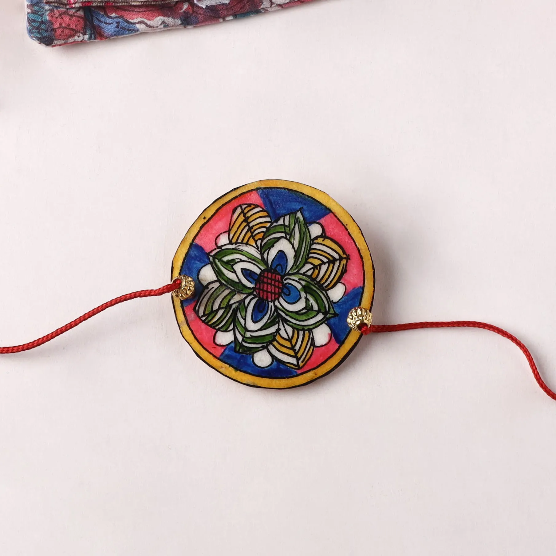Flower - Handpainted Tholu Bommalata Leather Rakhi (Assorted) 29 sold by Itokri product image thumbnail 2