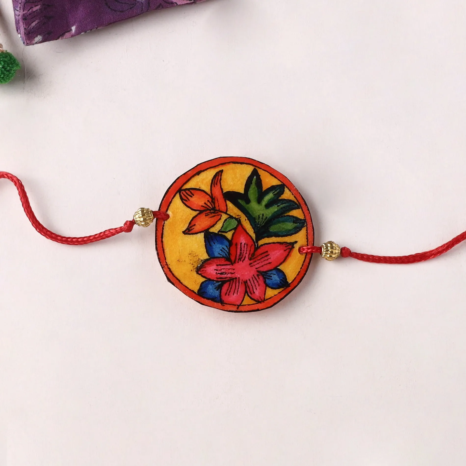 Flower - Handpainted Tholu Bommalata Leather Rakhi (Assorted) 28 sold by Itokri product image thumbnail 2