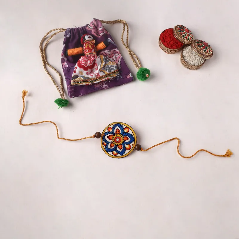 Handpainted Tholu Bommalata Leather Rakhi (Assorted) 25 made by Itokri