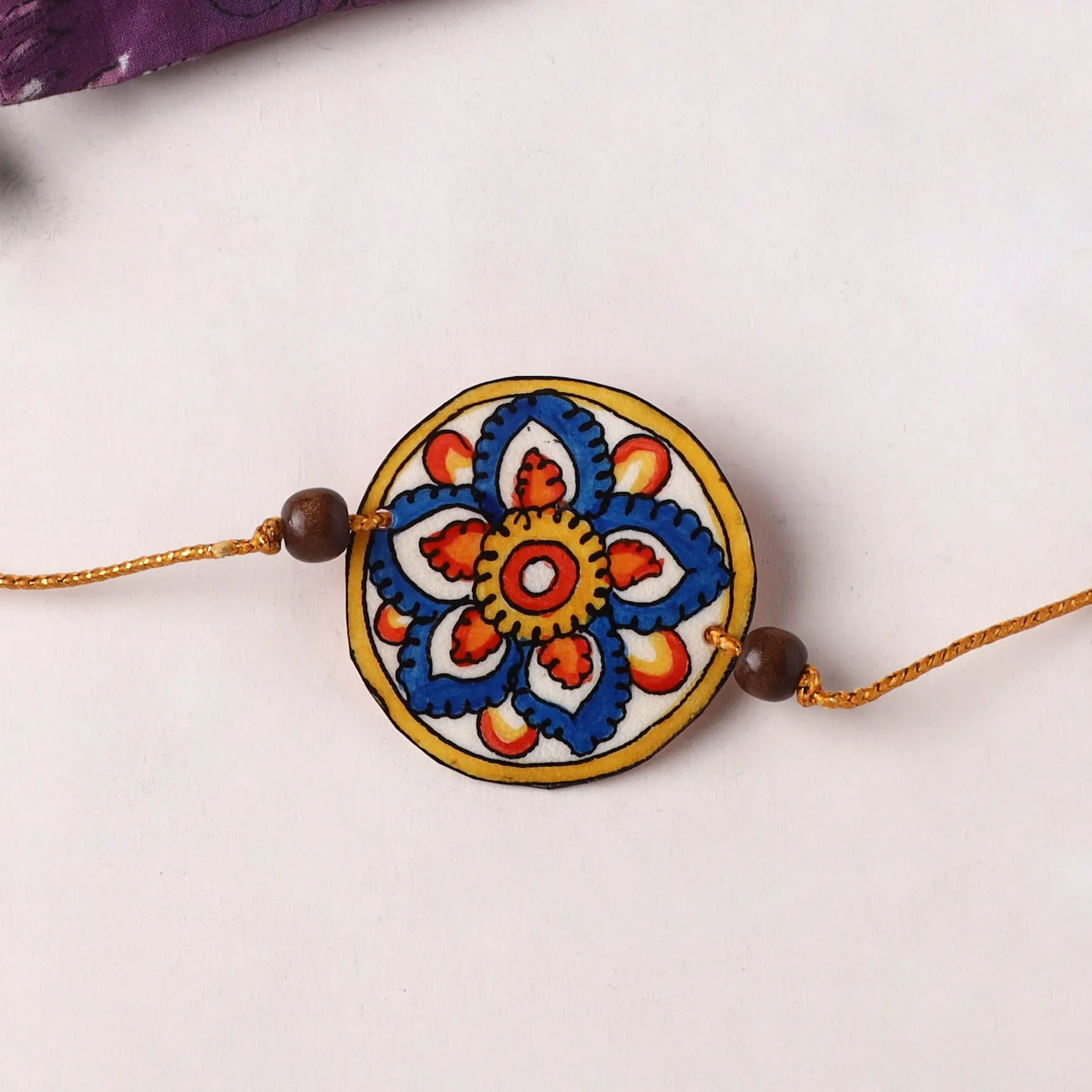 Handpainted Tholu Bommalata Leather Rakhi (Assorted) 25 sold by Itokri product image thumbnail 2
