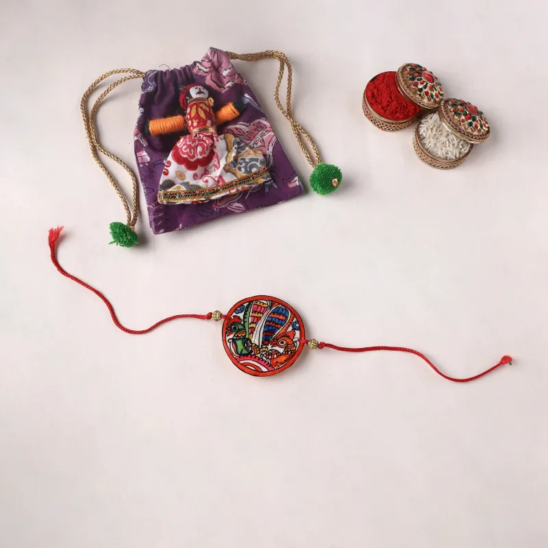 Peacocks - Handpainted Tholu Bommalata Leather Rakhi (Assorted) 23 made by Itokri