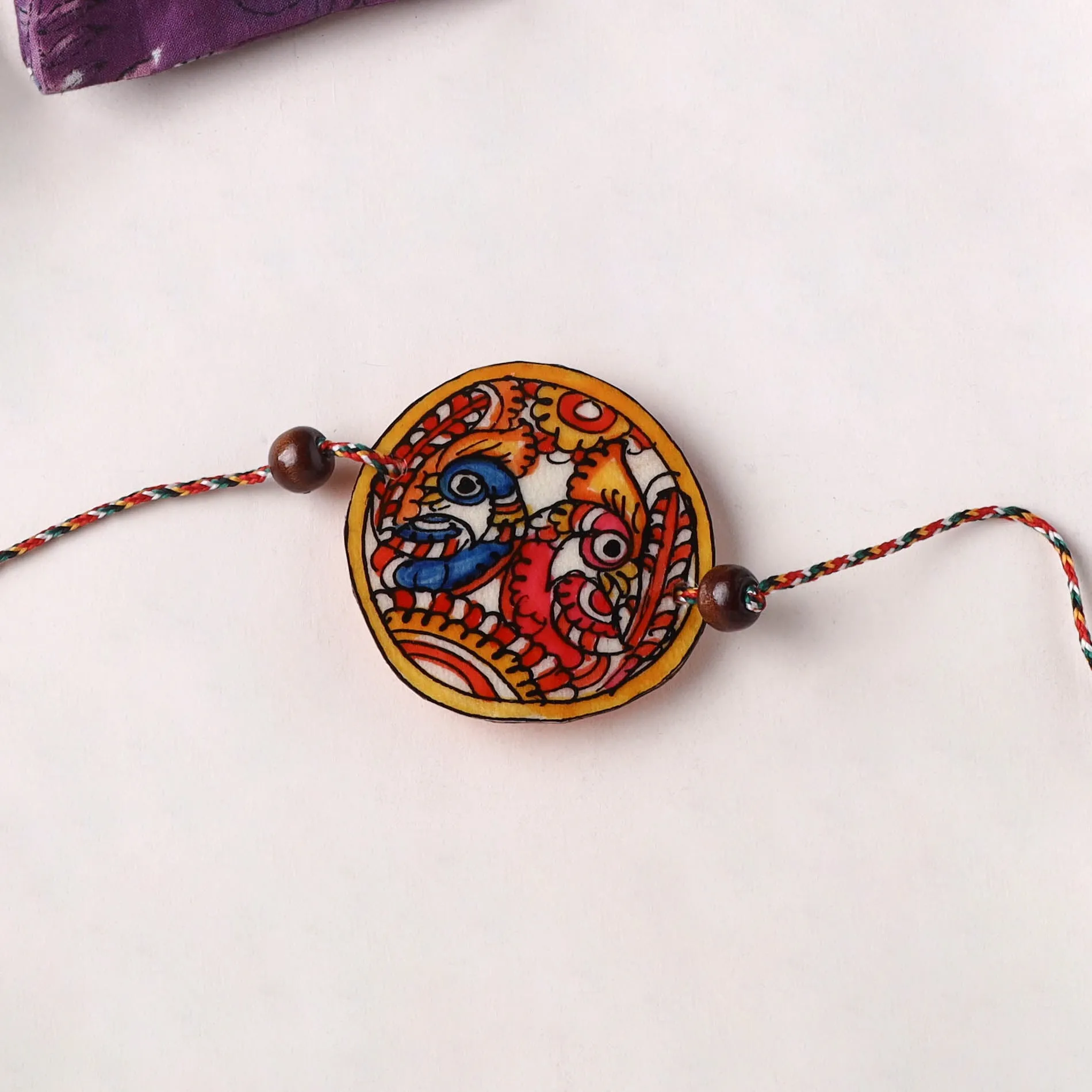 Handpainted Tholu Bommalata Leather Rakhi (Assorted) 22 sold by Itokri product image thumbnail 2