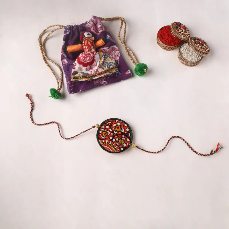 Handpainted Tholu Bommalata Leather Rakhi (Assorted) 19 made by Itokri