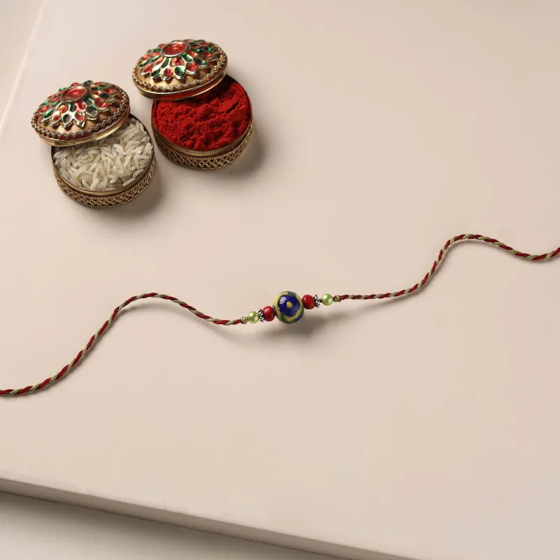 Multicolor - Handmade Blue Pottery & GS Bead Work Rakhi with Potli 10 made by Itokri