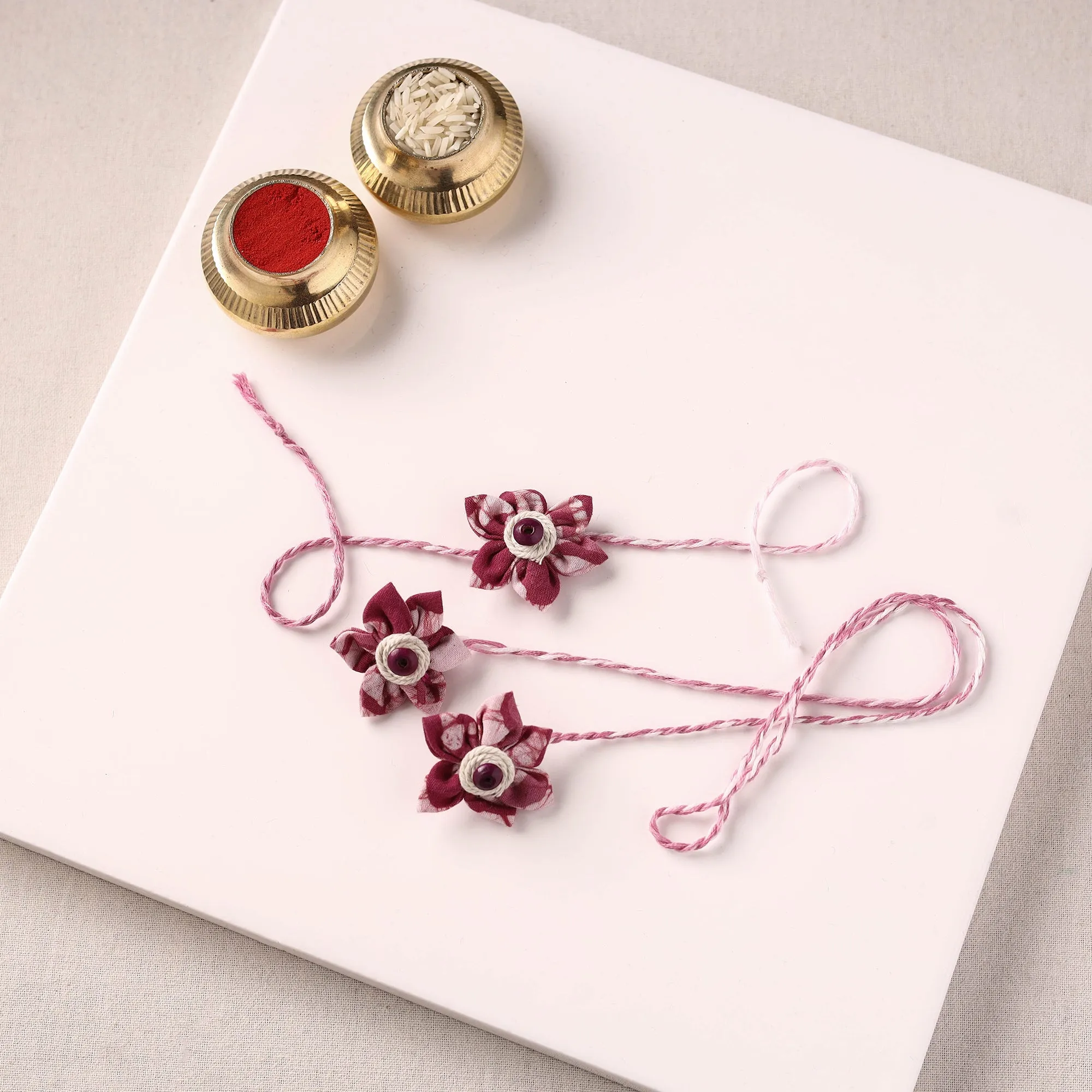Flower Handmade Thread Work Fabart Rakhi & Lumba Set with Potli 132 sold by Itokri