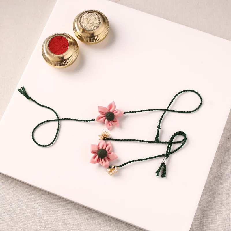 Flower Handmade Fabart Bhaiya Bhabhi Rakhi Set with Potli 109 made by Itokri