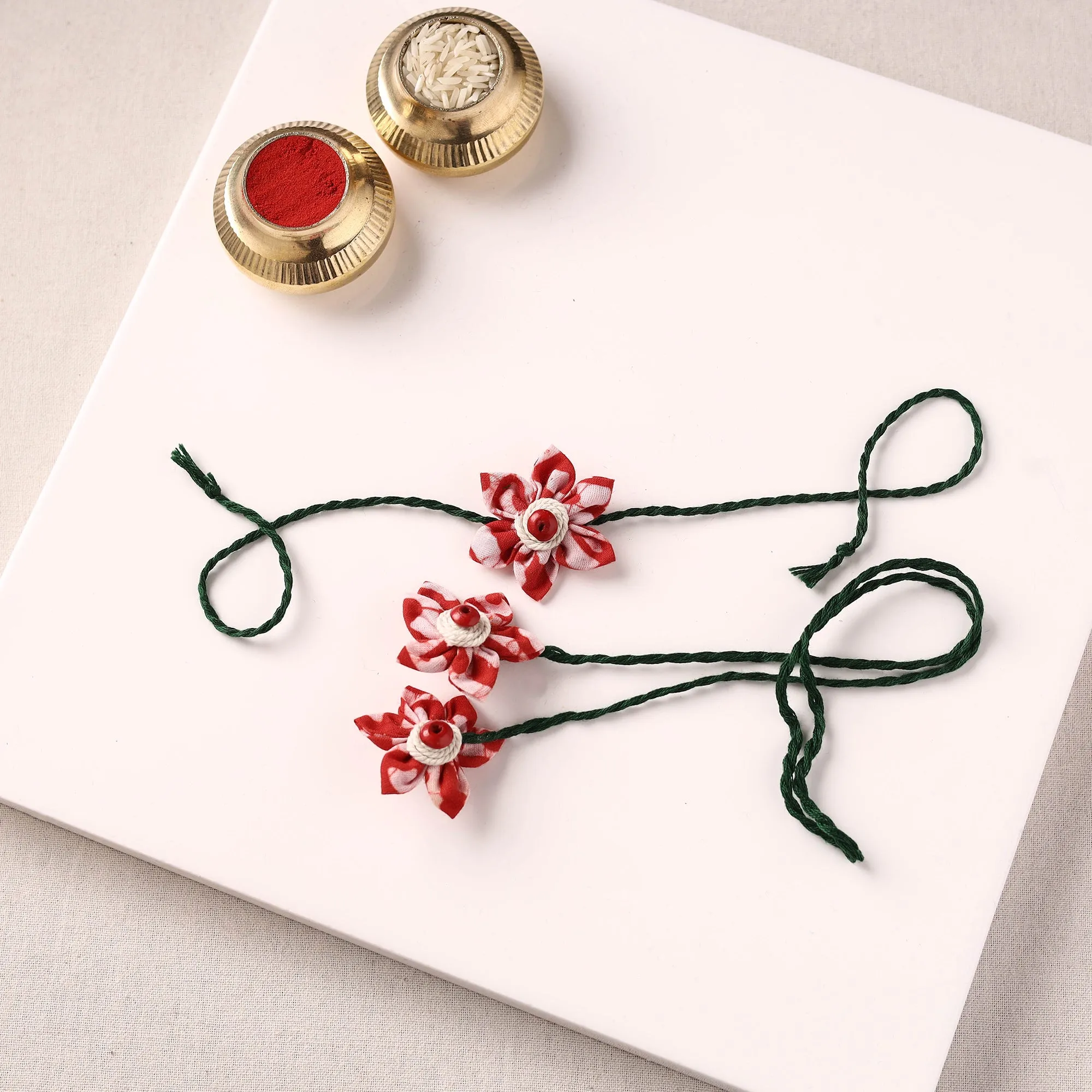 Flower Handmade Thread Work Fabart Rakhi & Lumba Set with Potli 124 sold by Itokri