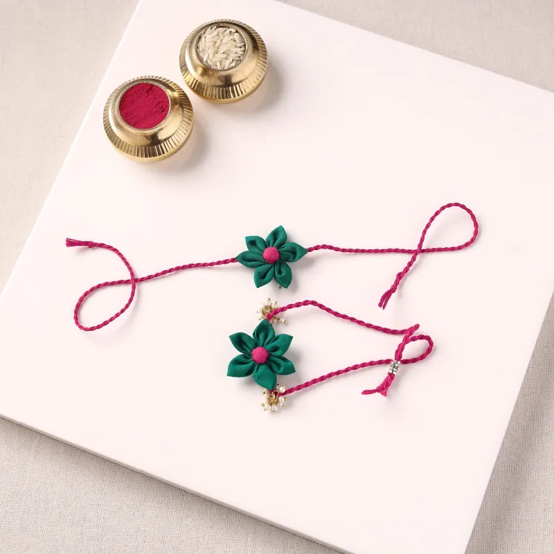 Flower Handmade Fabart Bhaiya Bhabhi Rakhi Set with Potli 119 made by Itokri